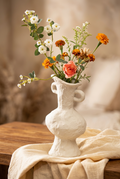 Matte white stoneware vase styled with flowers